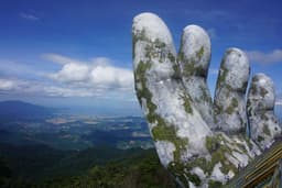 Cable Car Ride on Ba Na Hills while exlporing Golden Bridge, Linh Ung Pagoda, Wine Cellar, DAmour Flower Garden, Fantassy Park and King Peak